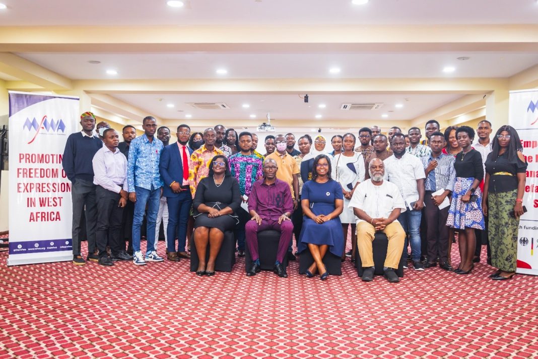 A group photograph of participants at the training